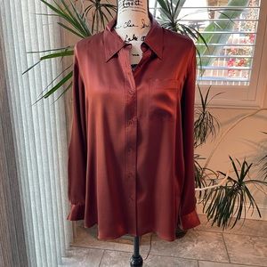 Silk blouse in a rich root beer brown. Dry cleaned